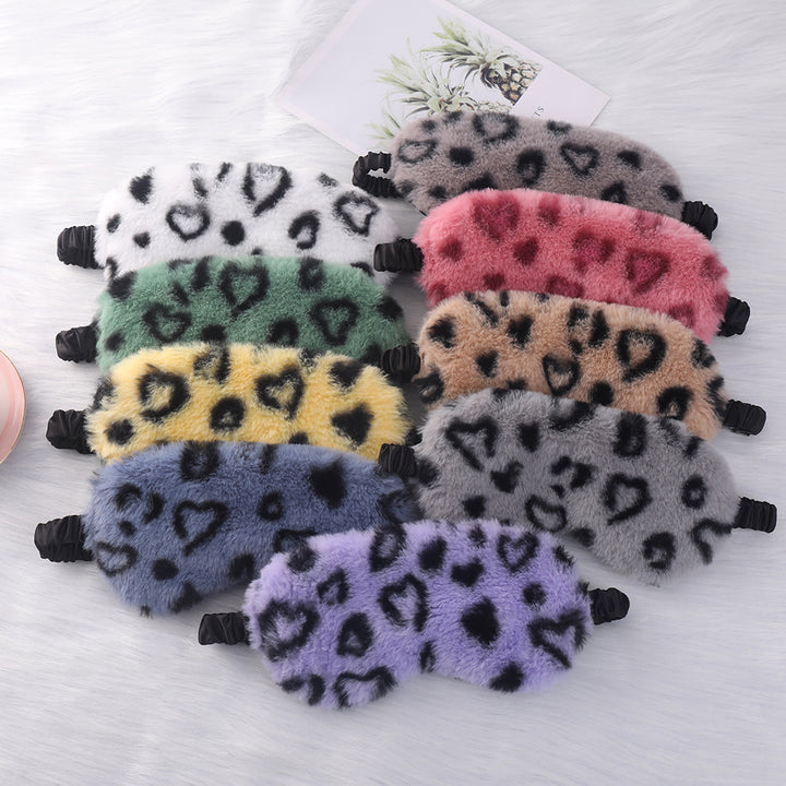 Women's cuddly faux fur sleep mask with heart-embossed surface and gathered comfort band Bowlift