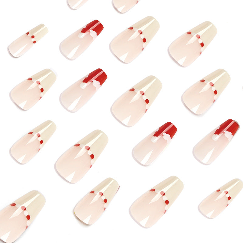 Artificial nail extensions with festive Christmas design Bowlift
