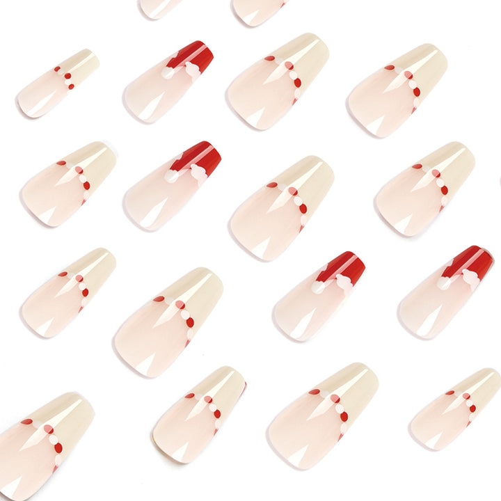 Artificial nail extensions with festive Christmas design Bowlift