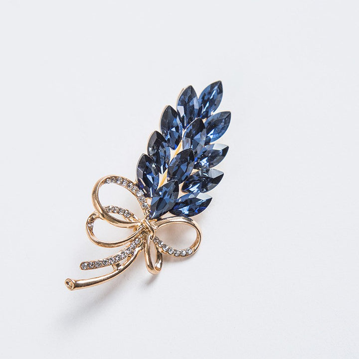 Elegante Brooch with Crystals Bowlift