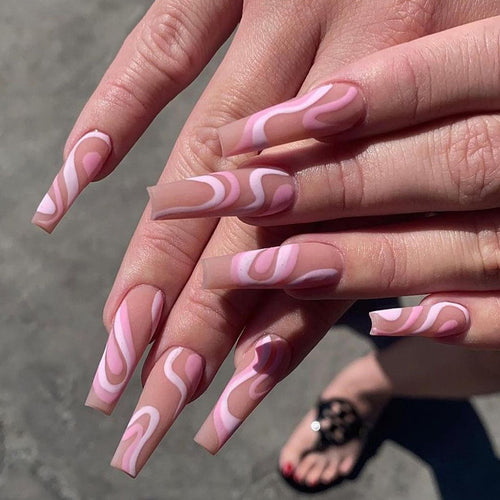 Artificial nail extensions with elegant wave design Bowlift