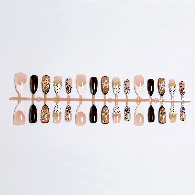 Exquisite nail art with elegant embellishments Bowlift