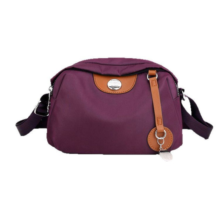 Shoulder bag with adjustable shoulder strap and clear compartment system Bowlift