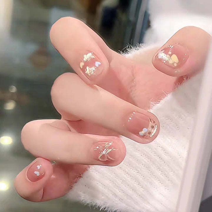 Artistic Press-On Nail Extensions with Floral Embellishments Bowlift