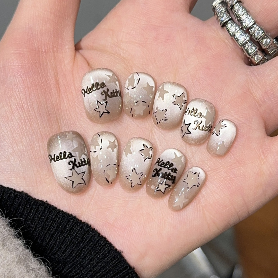 Artificial nail tips with Hello Kitty design Bowlift