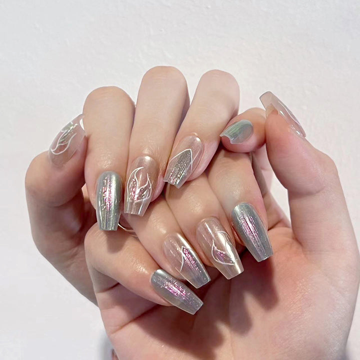 Artful artificial nails with transparent color gradient and delicate floral designs Bowlift
