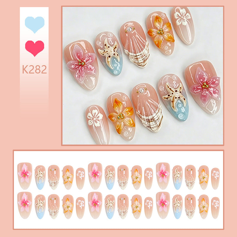 Artificial nails with floral decorations Bowlift