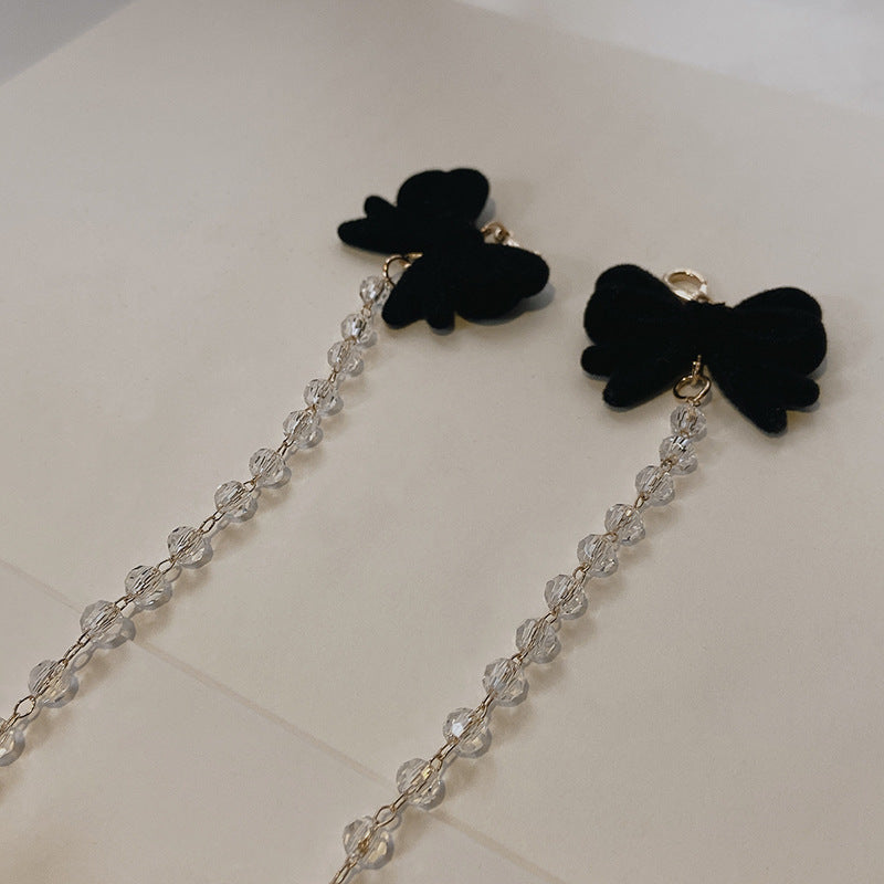 Jewelry holder chain with velvet bow pendant Bowlift
