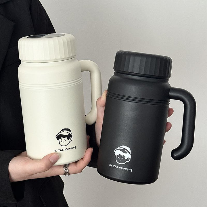 Women’s insulated carafe with ergonomic carrying handle and innovative closure system Bowlift