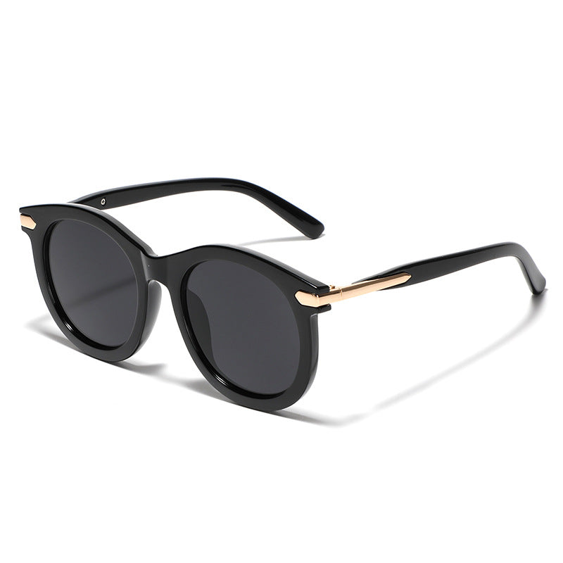 Women's fashionable sunglasses with transparent frame and golden accents Bowlift