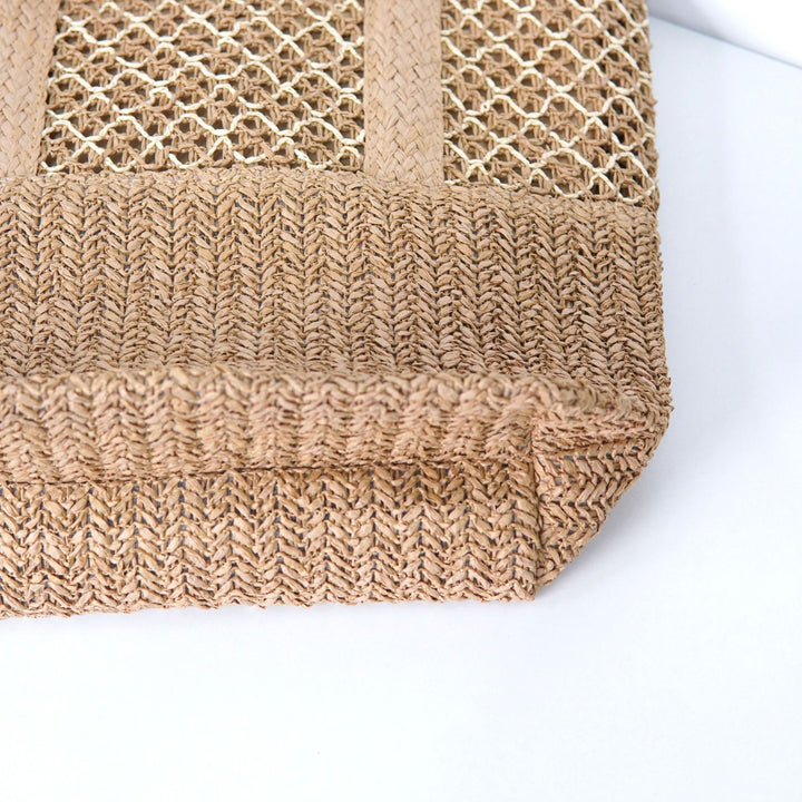 Beach bag with mesh structure and tassel details Bowlift