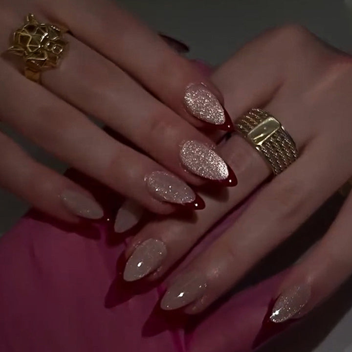 Artificial stiletto nails with sparkling tips Bowlift