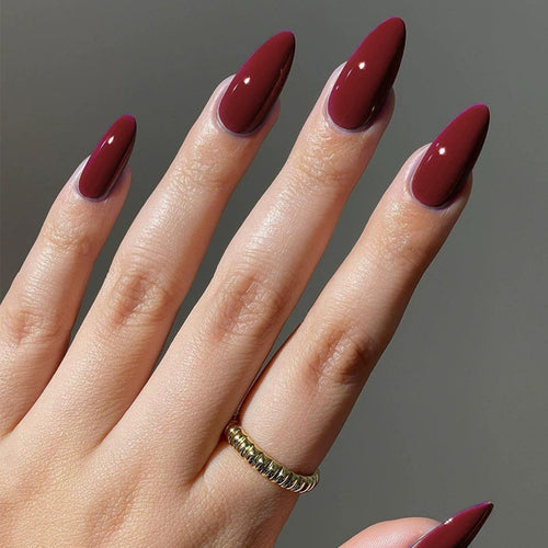 High-Gloss Stiletto Nail Enhancements Bowlift