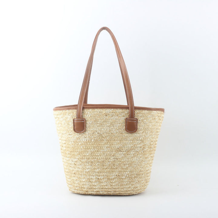 Braided basket bag with elegant leather handles Bowlift