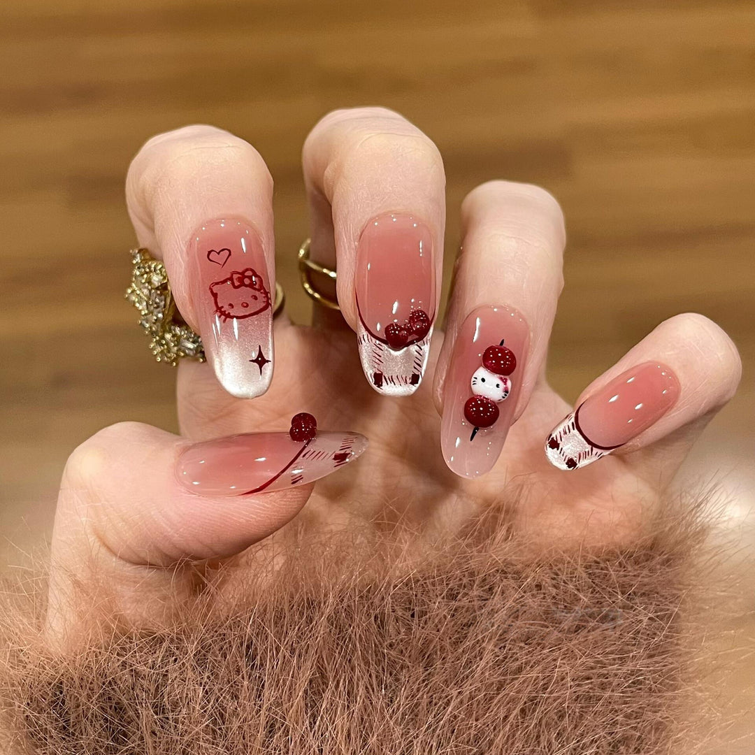 Artificial nails with playful Hello Kitty design Bowlift