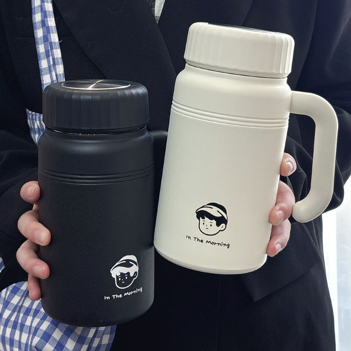Women's insulated drinking bottle with ergonomic handle and practical leak protection Bowlift
