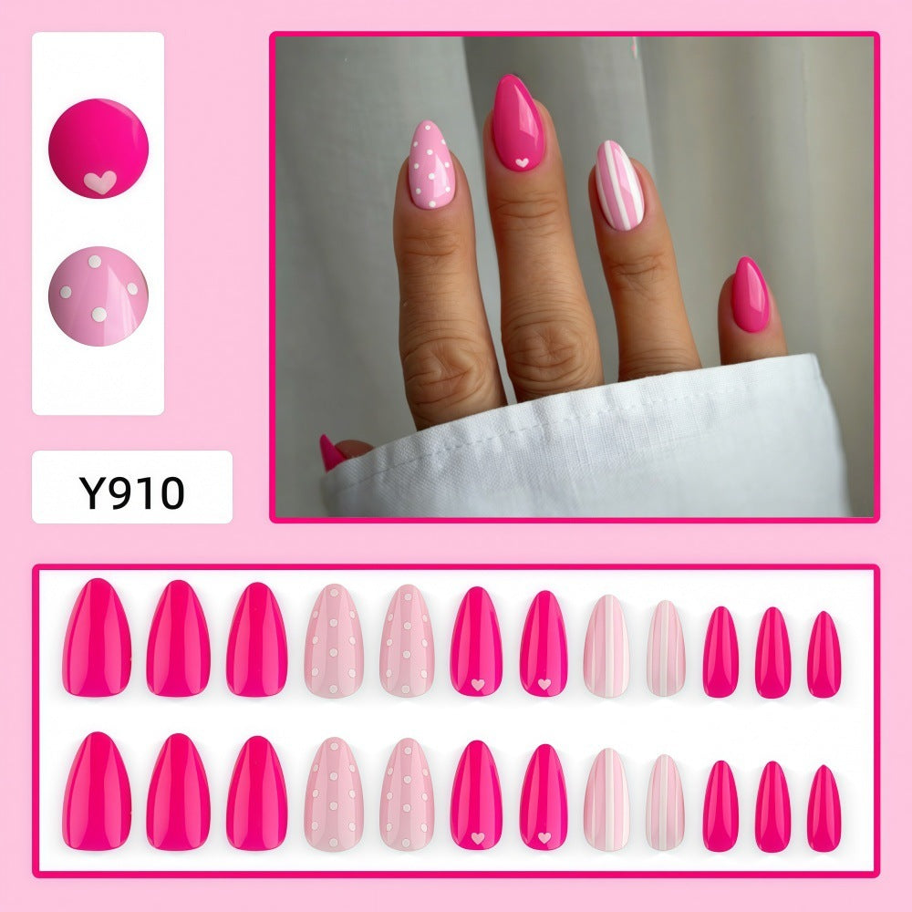 Artificial nails in playful design with hearts and dots Bowlift