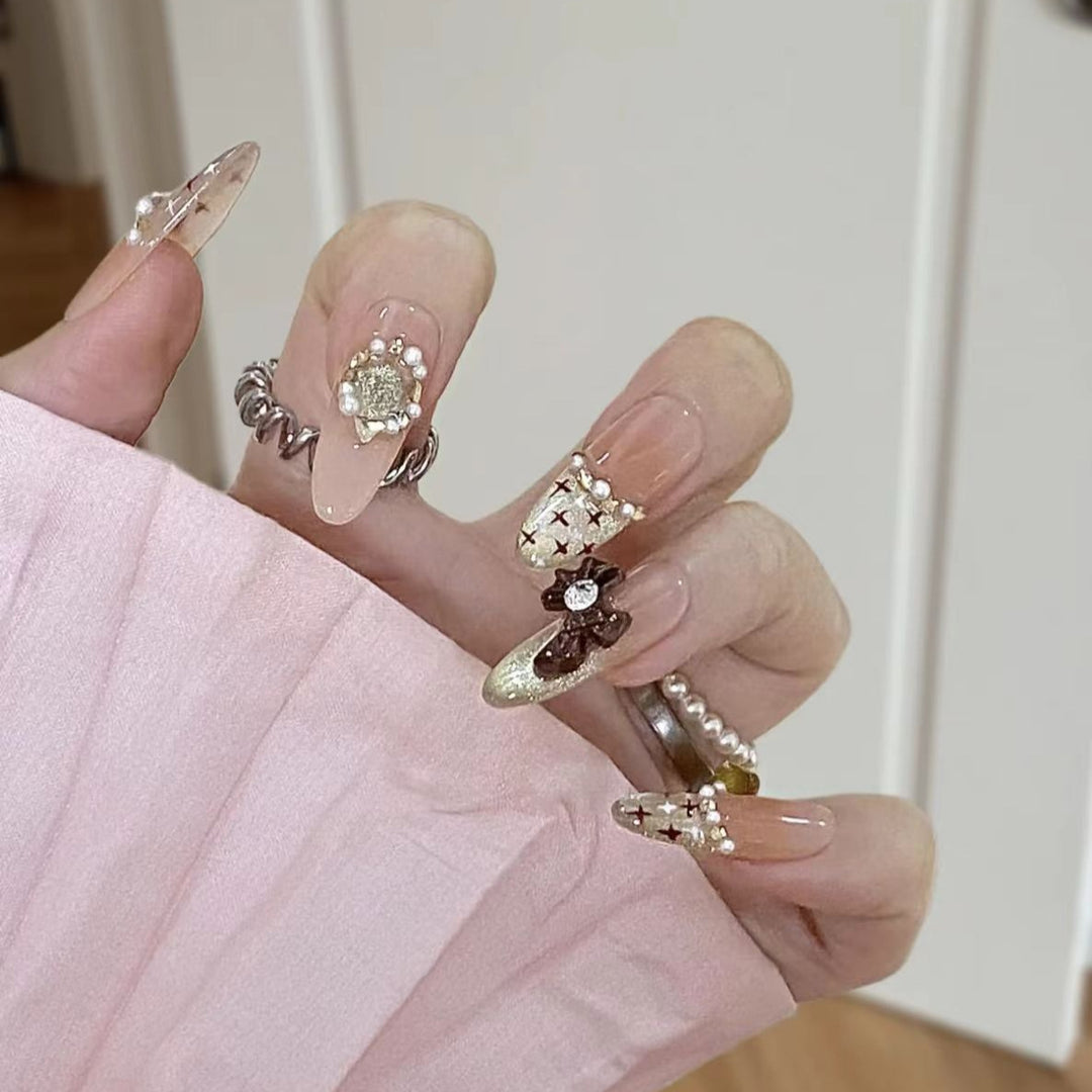 Artistic Stiletto Press-On Nail Set with Floral Embellishments Bowlift