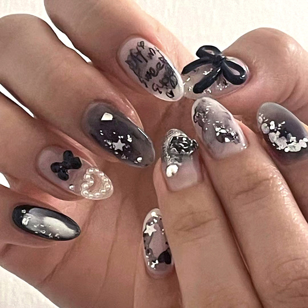 Artificial nail art with unique black and white design Bowlift