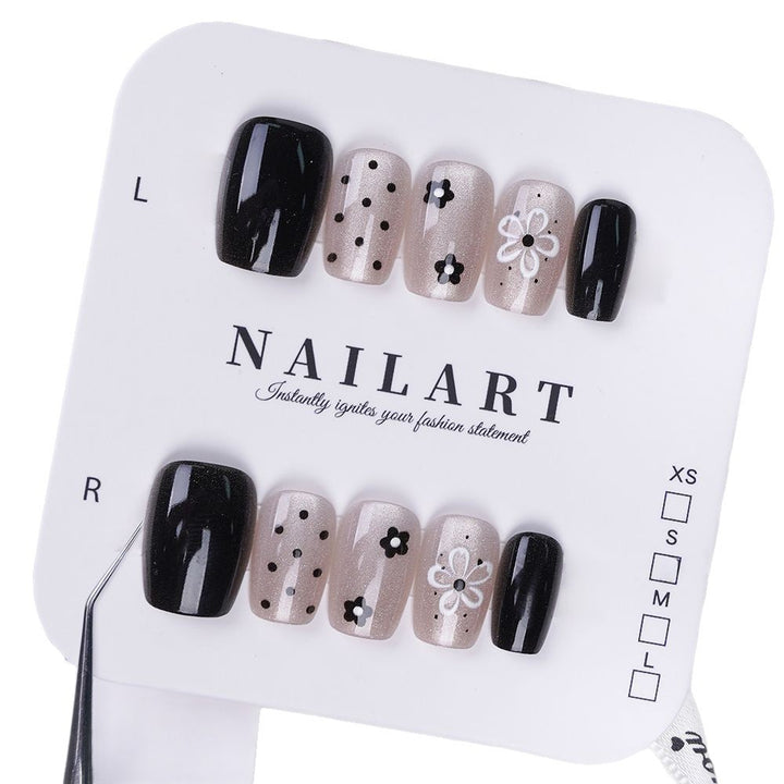 Artistic Press-On Nail Set with Floral and Speckled Design Bowlift