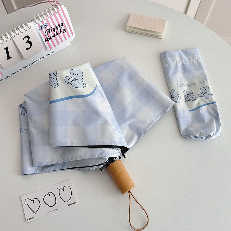 Women's Foldable Umbrella with Playful Checkered Pattern Bowlift