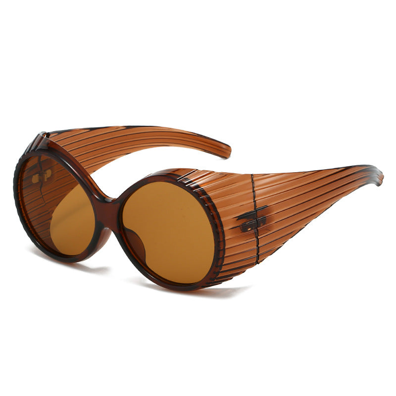 Women's extravagant sunglasses with unique wave design Bowlift
