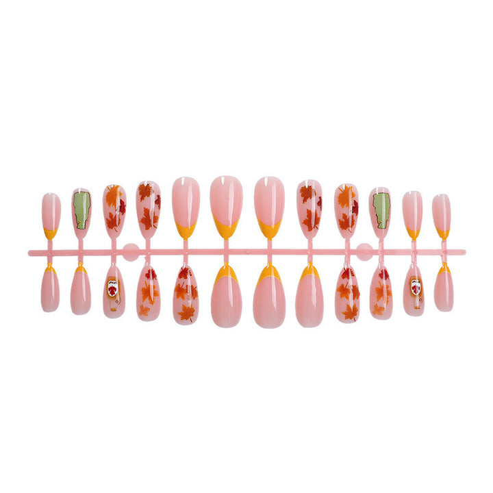 Artificial nail set with autumn leaf decorations and elegant color gradients Bowlift