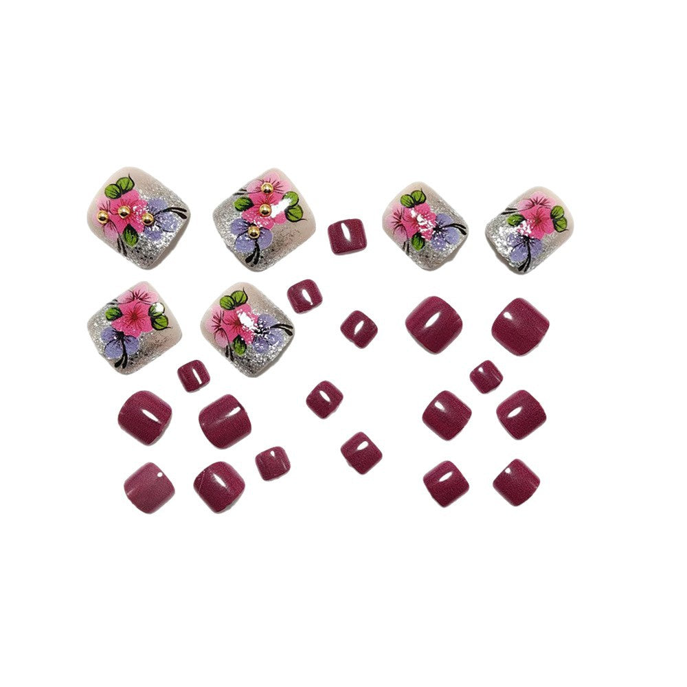 Artificial nails with floral designs and glitter effects Bowlift