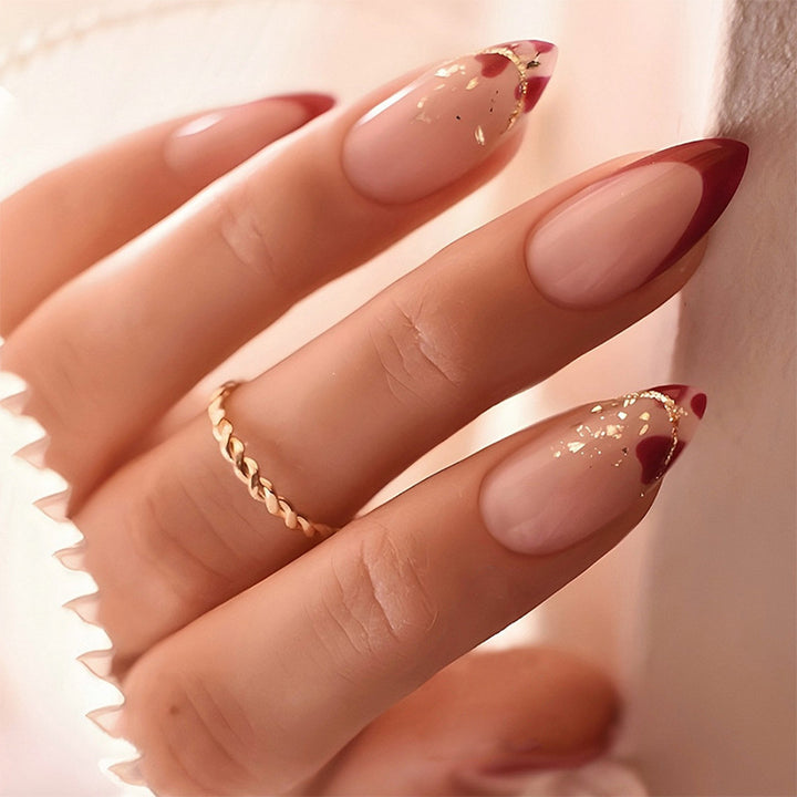 Elegant Stiletto Press-On Nail Set with Decorative Gold Accents Bowlift