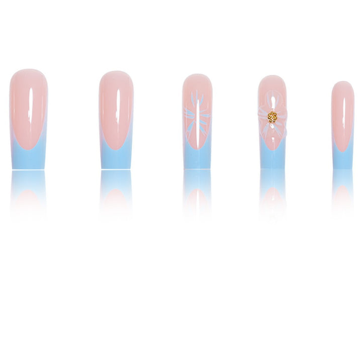 Artistic Long Press-On Nails with Floral Accents Bowlift
