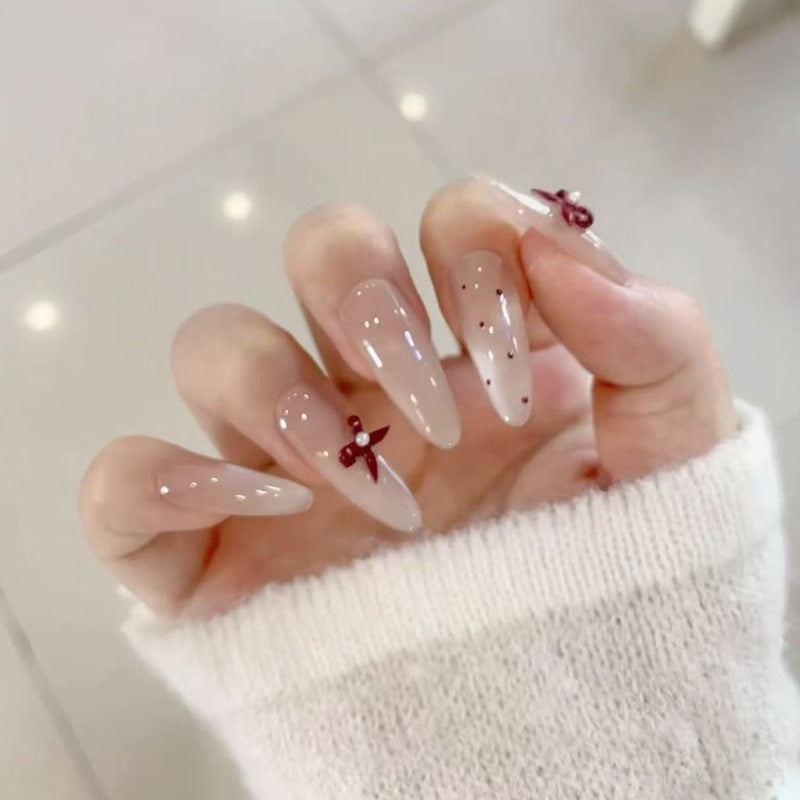 Elegant Stiletto Press-On Nails with Decorative Accents Bowlift