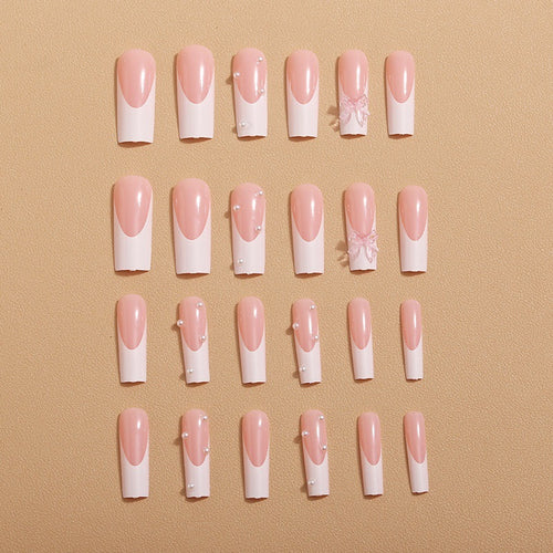 Artistic nail extensions with pearls and bows decorations Bowlift