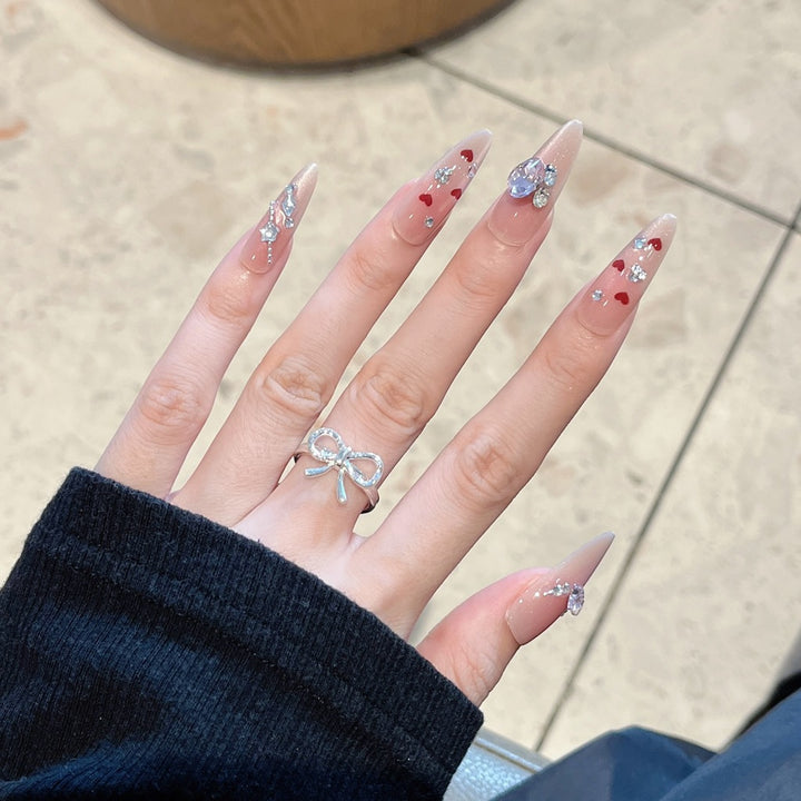 Artistic Nail Design with Decorative Elements Bowlift
