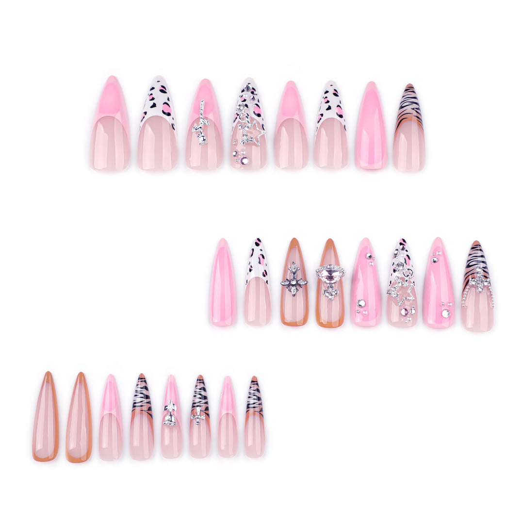 Artful stiletto nails with glitter and rhinestone embellishments Bowlift