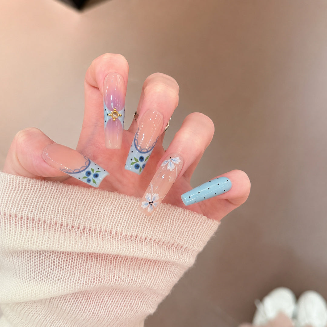 Artistic Press-On Nail Set with Floral and Geometric Design Bowlift