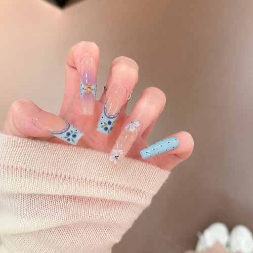 Artistic Press-On Nail Set with Floral and Geometric Design Bowlift