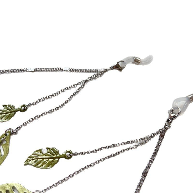 Fashionable glasses holder chain with leaf motifs Bowlift