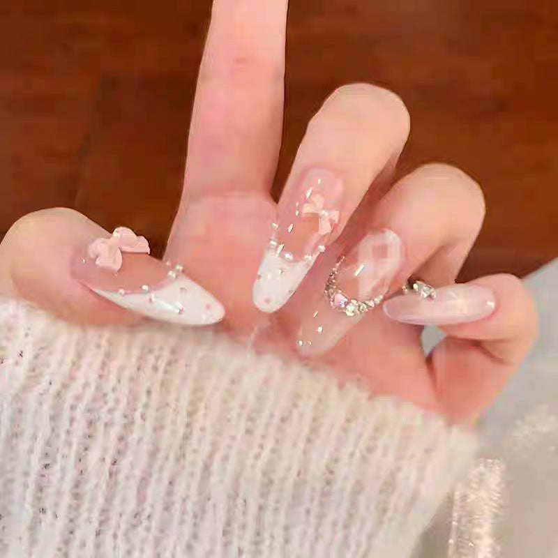 Artistic Long Stiletto Press-On Nail Set with Decorative Floral Accents Bowlift