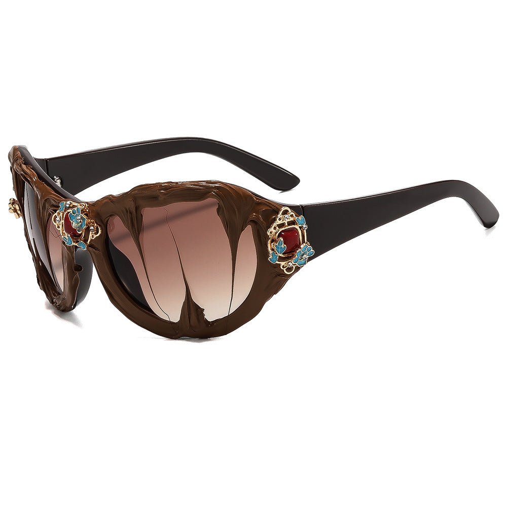 Ladies extravagant sunglasses with floral crystal embellishments Bowlift