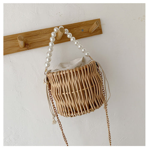Women’s handbag with elegant pearl handle and braided design Bowlift