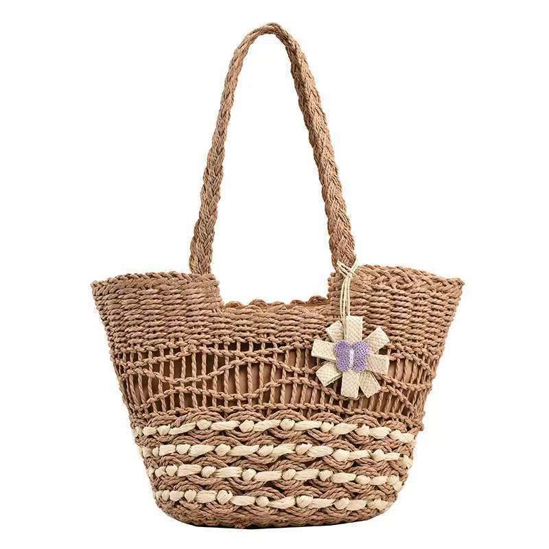 Handwoven beach bag with floral accents Bowlift