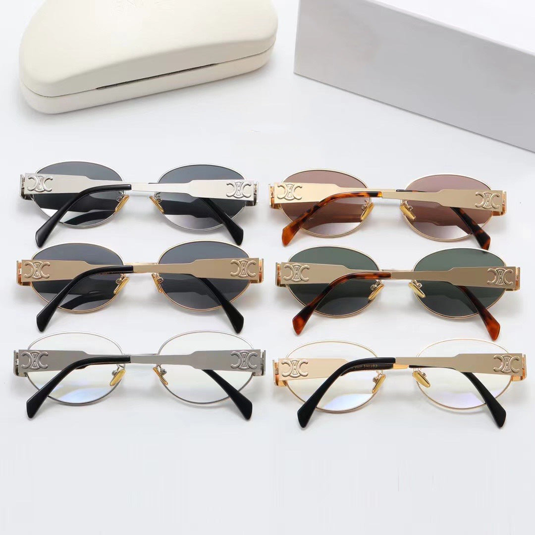 Women elegant oval sunglasses with gold-colored frame Bowlift