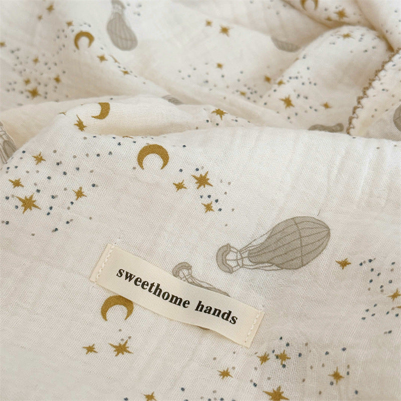 Unisex Muslin Blanket with delicate floral design and elegant ruffles Bowlift