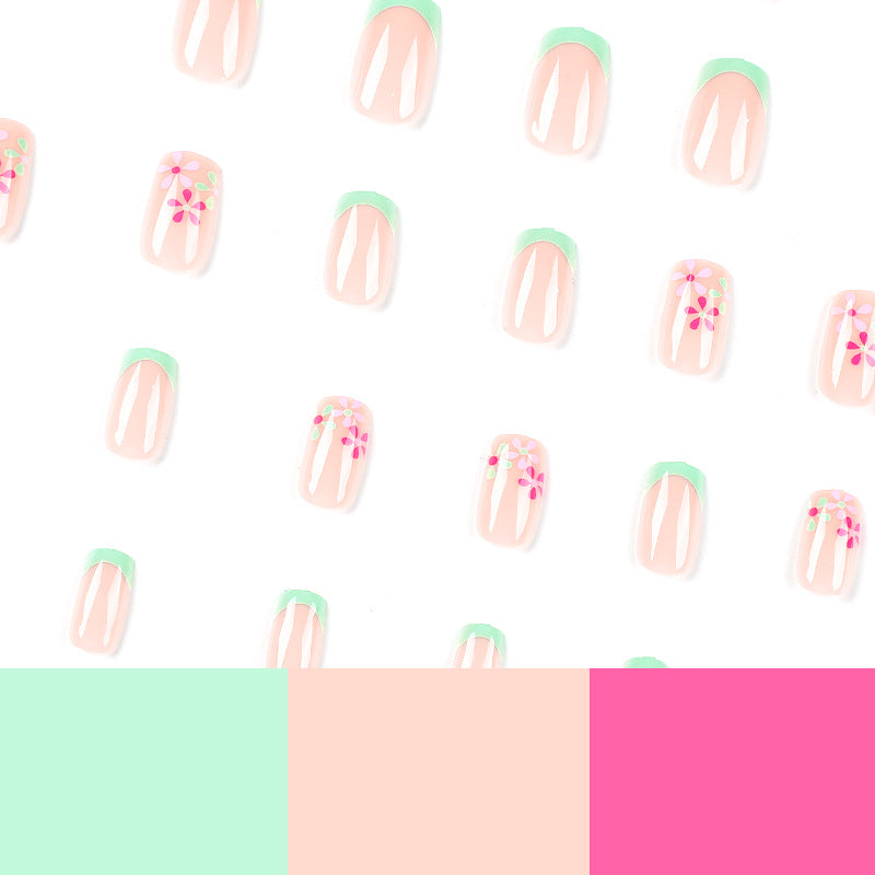 Artificial nails with floral accents and neon tips Bowlift