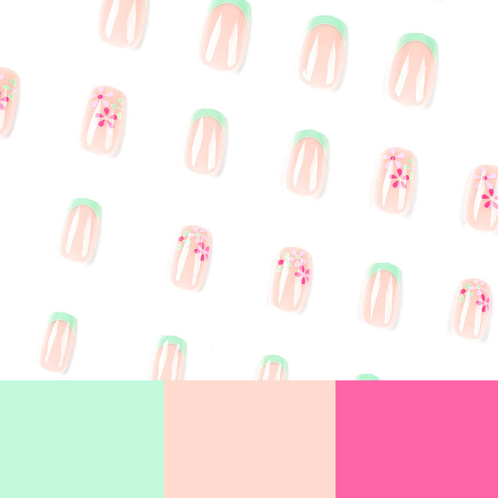 Artificial nails with floral accents and neon tips Bowlift