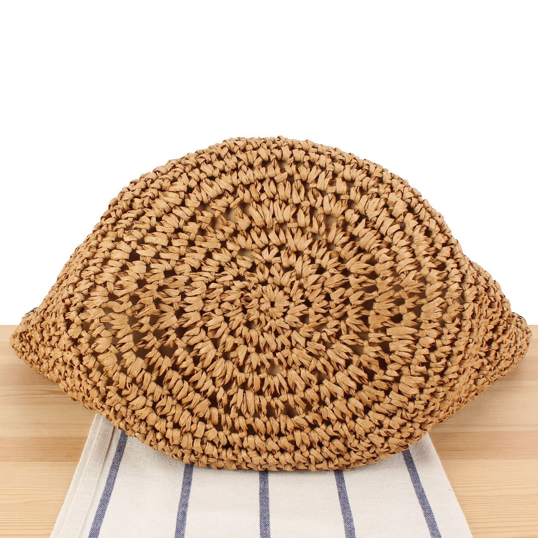 Beach shoulder bag made of handwoven natural material with comfortable carrying handles Bowlift