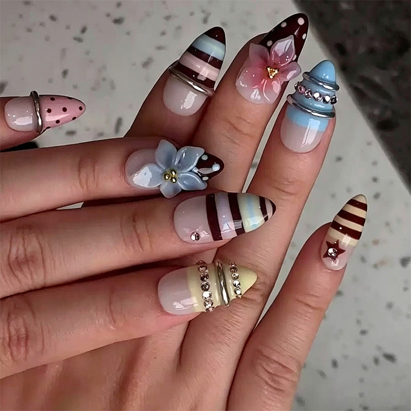 Nail art set with floral and geometric designs Bowlift