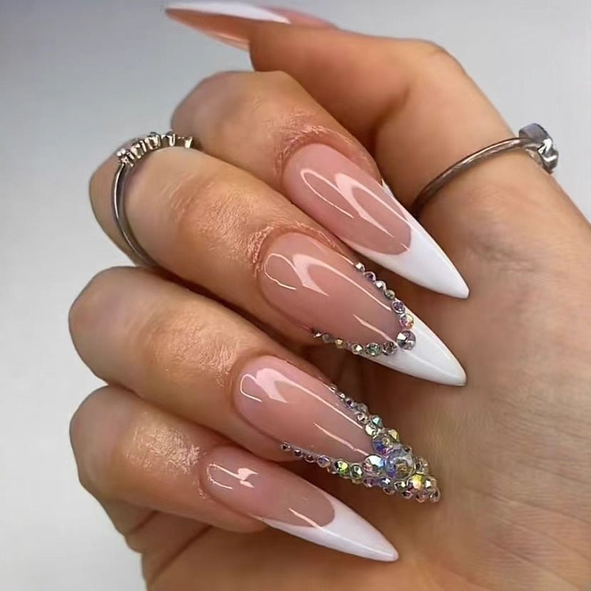 Artificial nail set with glamorous rhinestone decorations and elegant tips Bowlift