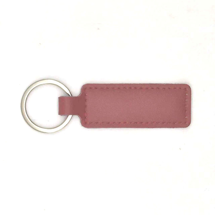 Unisex keychain with customizable faux leather Bowlift