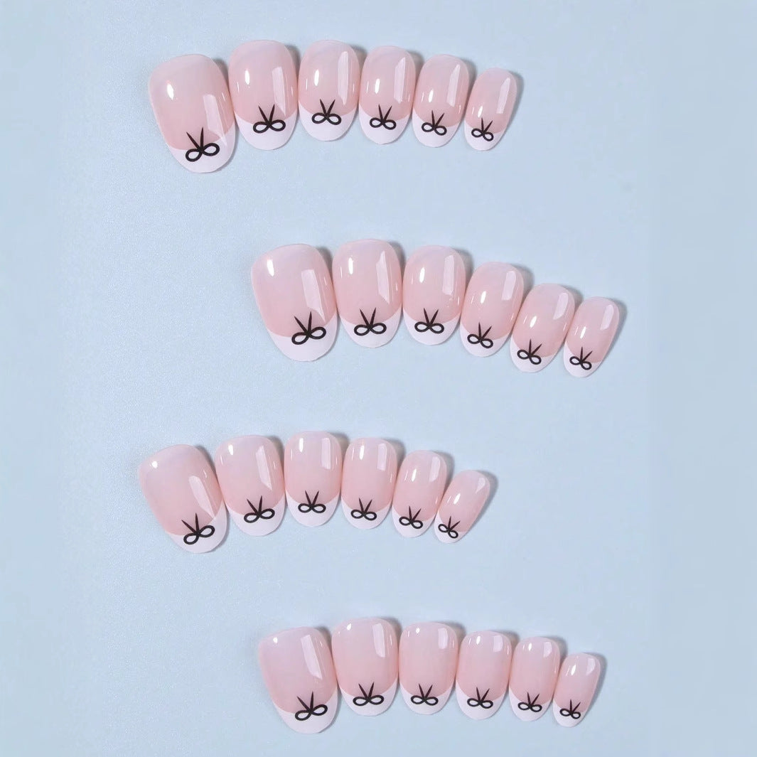 Artificial nails with elegant bows and high-gloss surface Bowlift